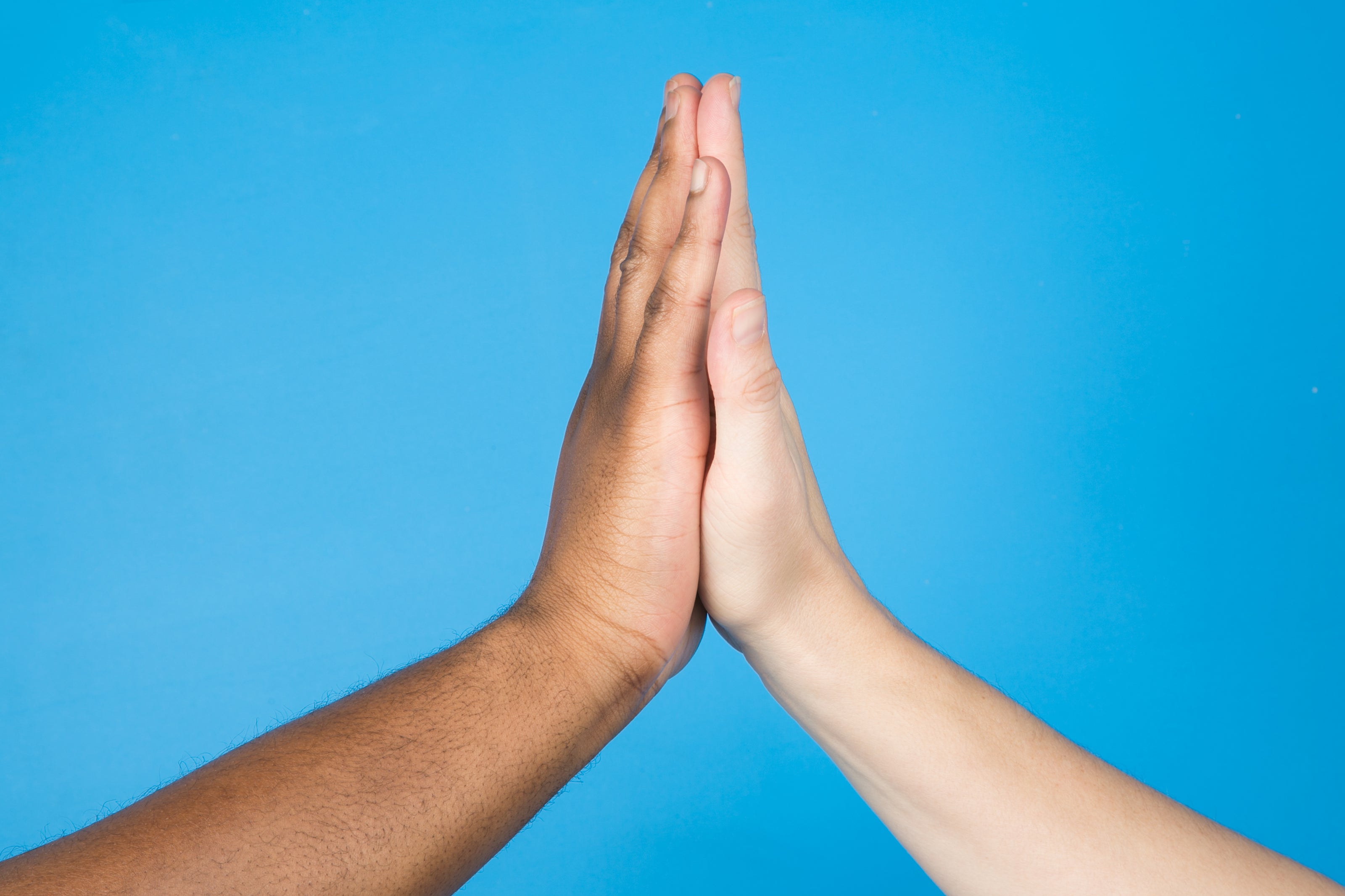 high fiving hands cleaning office in Reno