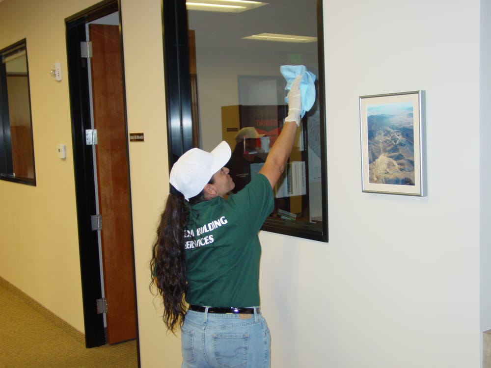 Cleaning a Window - Reno Office Cleaning